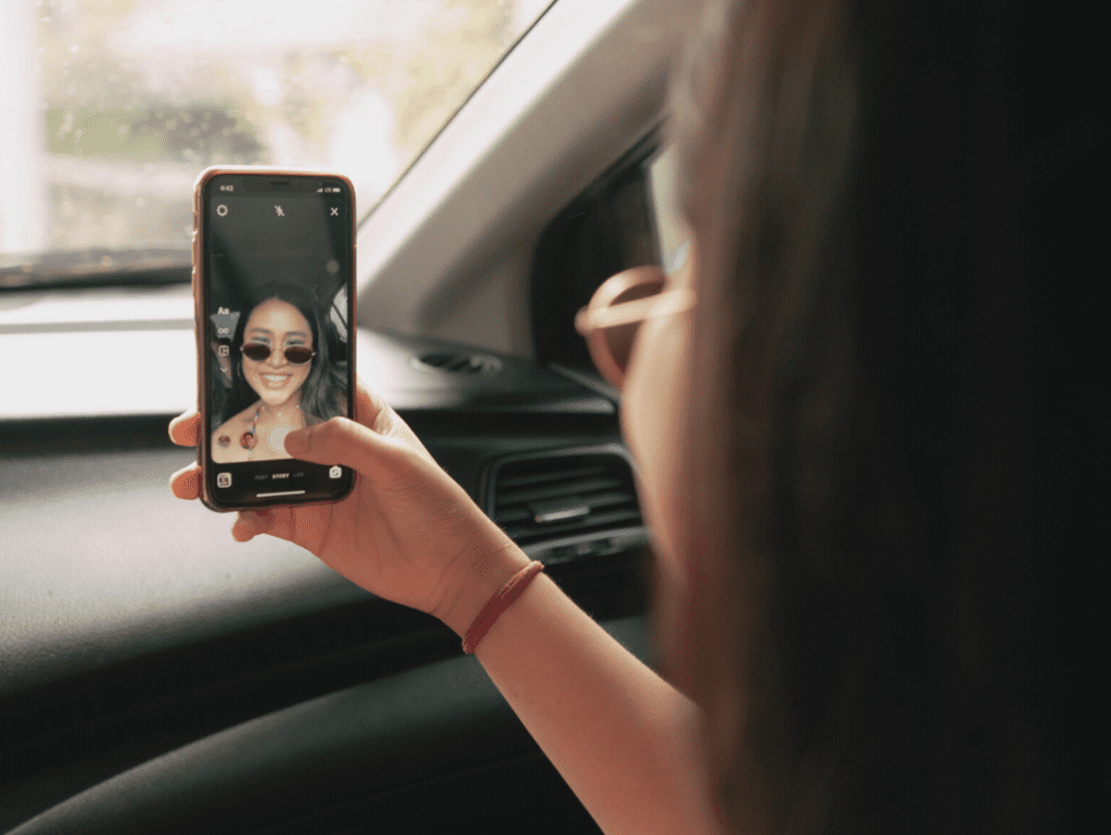 Girl going live on Instagram in her car